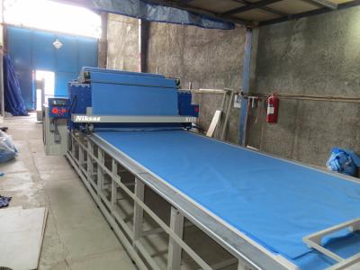 دستگاه طاقه پهن كن