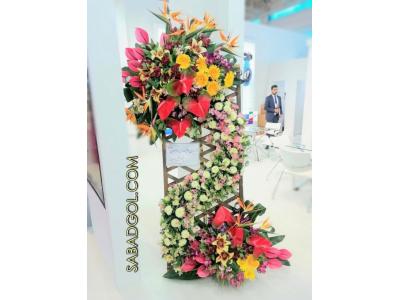 طراحی و اجرای دیوار گل مصنوعی-دیوار سبزمصنوعی-ساخت درخت شکوفه مصنوعی- ساخت درخت نخل مصنوعی و اجرای محوطه سبز با گلها و گیاههان مصنوعی با کیفیت