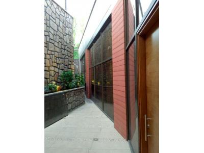فروش ساختمان-اجرای نمای ساختمان با چوب پلاست 